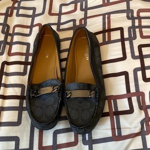 Woman’s size 7 Coach shoes.